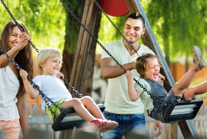 Childaren playing on swings