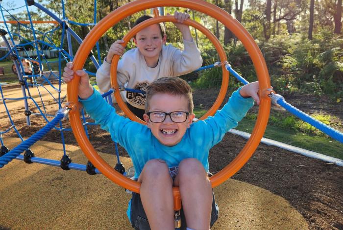 Photo of children playing on playspace