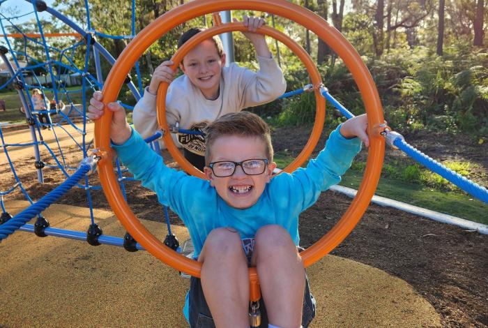 Photo of children playing on playspace