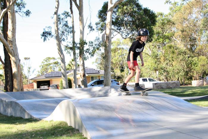 Photo of young person riding their skate board